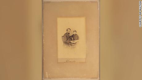 Original albumen 3.75ʺ x 5.25ʺ photograph of President Abraham Lincoln with his son Tad, taken by Mathew Brady on February 9, 1864.