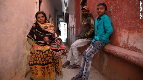 Vaijyanti Marawi and two of her sons in Bhopal, India, on February 7, 2021. Marawi&#39;s husband Deepak Marawi died in December after participating in the Phase 3 clinical trials.