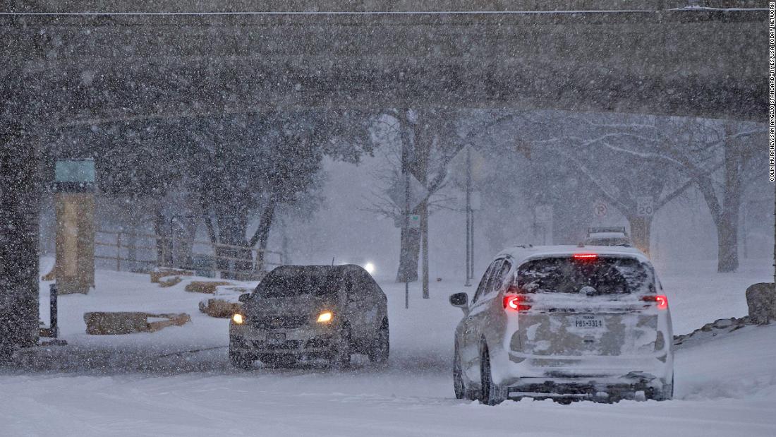 A few cars drive in San Angelo, Texas, on Sunday, February 14.