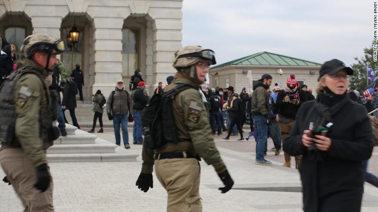 Watkins, center, and Crowl, left, were among alleged Oath Keepers who wore body armor and the group&#39;s insignia at the Capitol on January 6.