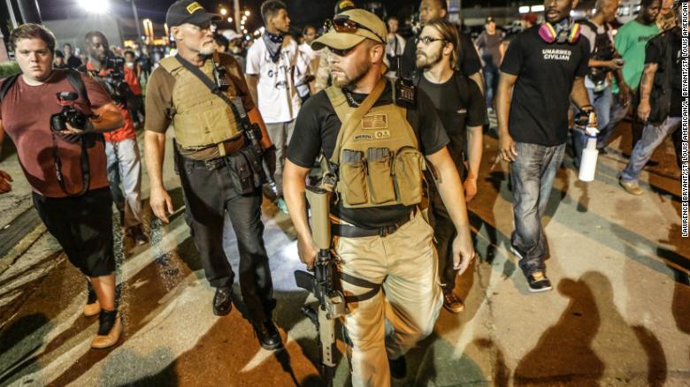 Armed Oath Keepers went to Ferguson, Missouri, after the killing of Michael Brown in 2014 and again, pictured, a year later.