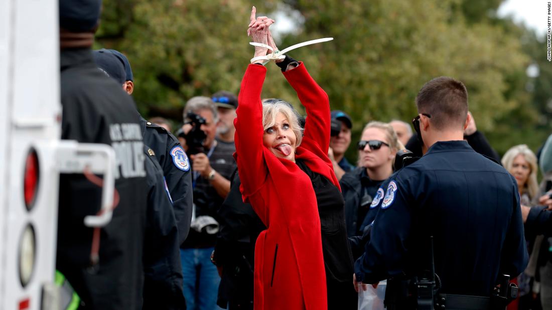 Fonda is taken away in ziptie handcuffs as she is arrested during a climate crisis protest at the US Capitol in October 2019. It was her third consecutive week getting arrested at what she called her &quot;Fire Drill Fridays&quot; protests. &quot;We have to behave like our house is on fire, because it is,&quot; Fonda said, referencing a phrase often said by teenage climate activist Greta Thunberg. Fonda was arrested five times from October 2019 to December 2019.