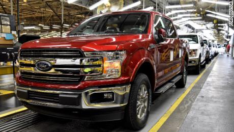 Ford F-150s roll down the line at Ford&#39;s Kansas City Assembly Plant. 