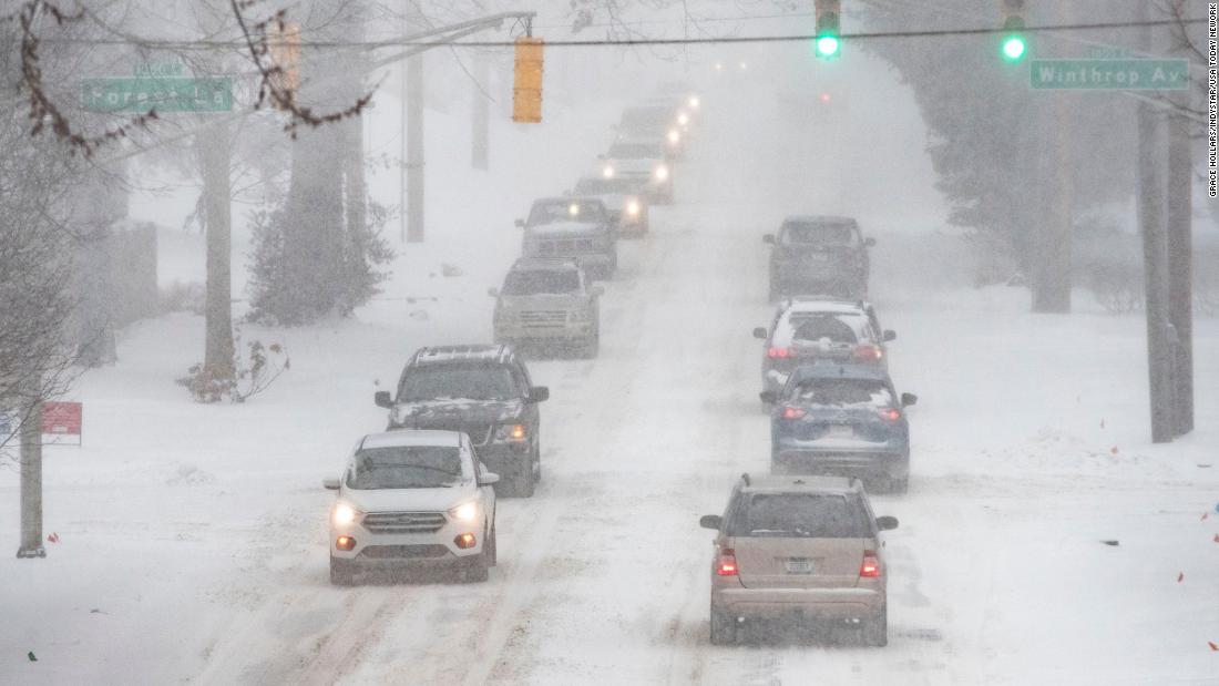 Motorists take it slow in Indianapolis on Monday.