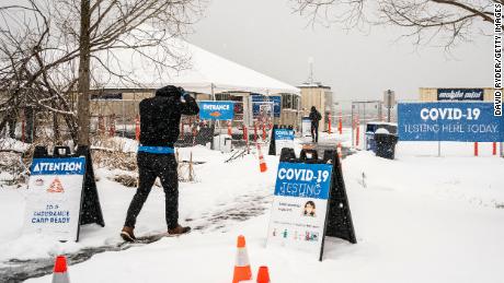 People enter a Covid-19 test site in Seattle, Washington on Saturday.
