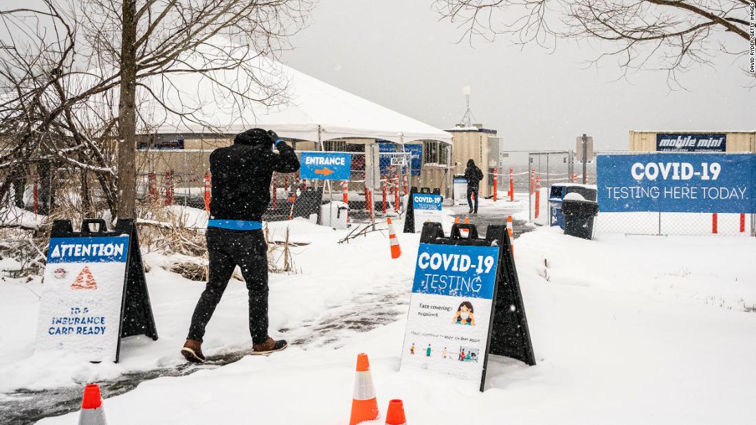 People enter a Covid-19 testing site in Seattle on Saturday. Seattle reported more than 11 inches of snow over the weekend, its most since January 1972. 