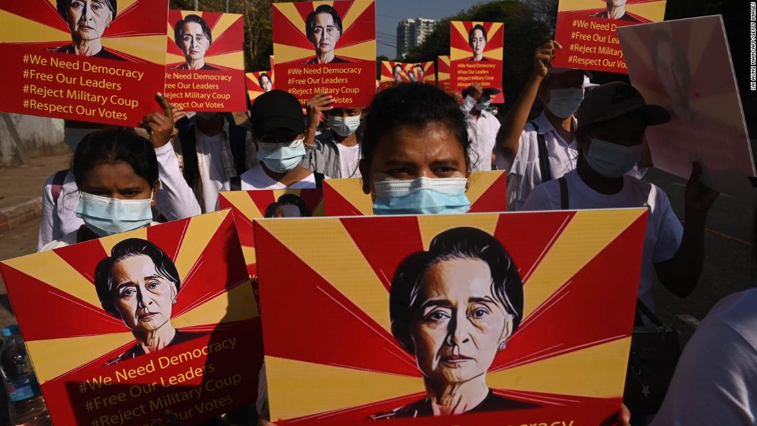 Protesters demonstrate in Yangon on February 14.