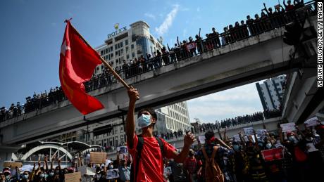 Protesters gather to demonstrate against the February 1 military coup, in downtown in Yangon on February 8.