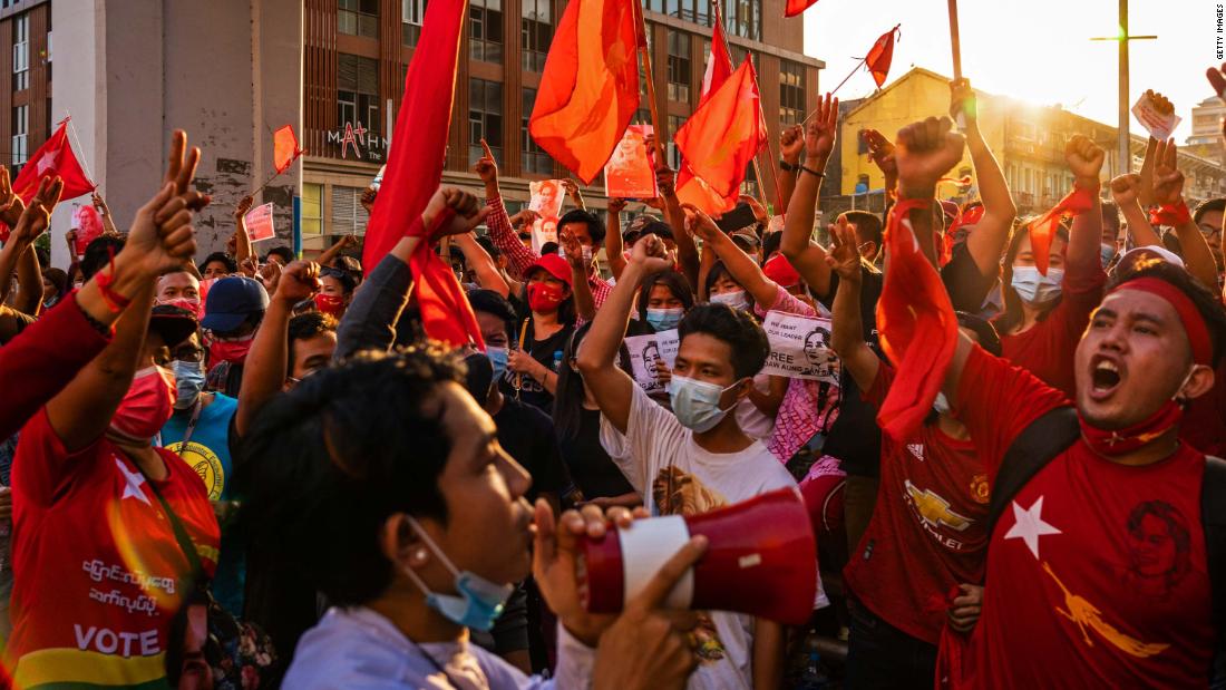 Protesters shout slogans in Yangon on February 7.