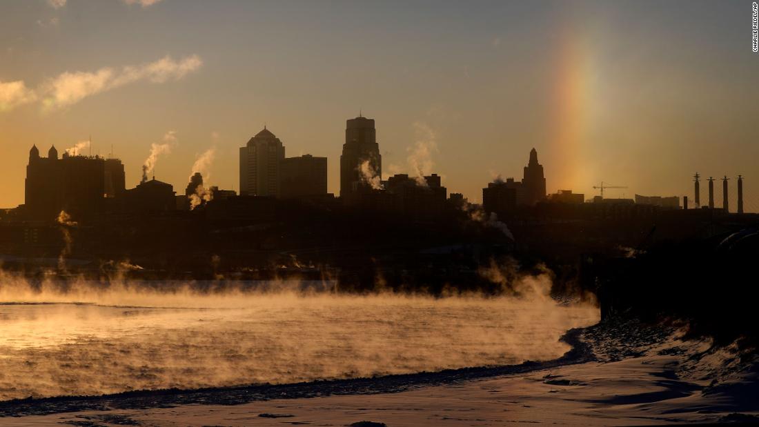 Steam rises off the frozen Missouri River in Kansas City.