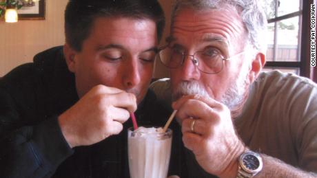 Sean and Pat share a milkshake in 2015.
