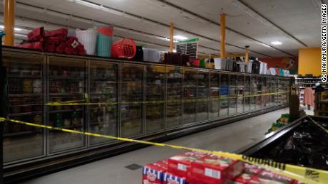 Freezer sections are closed off in Fiesta supermarket on Tuesday in Houston, Texas. 