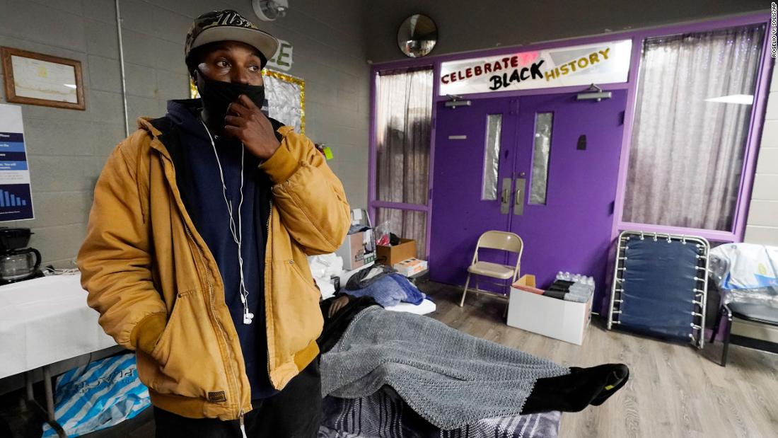 Jonathan Callahan expresses his gratitude after being referred to the warming shelter at the Johnnie Champion Community Center in Jackson, Mississippi, on Wednesday, February 17. Some people staying at the shelter had lost power, water and heat at their homes following the winter storms. Others were homeless. Food, blankets and cots were provided.