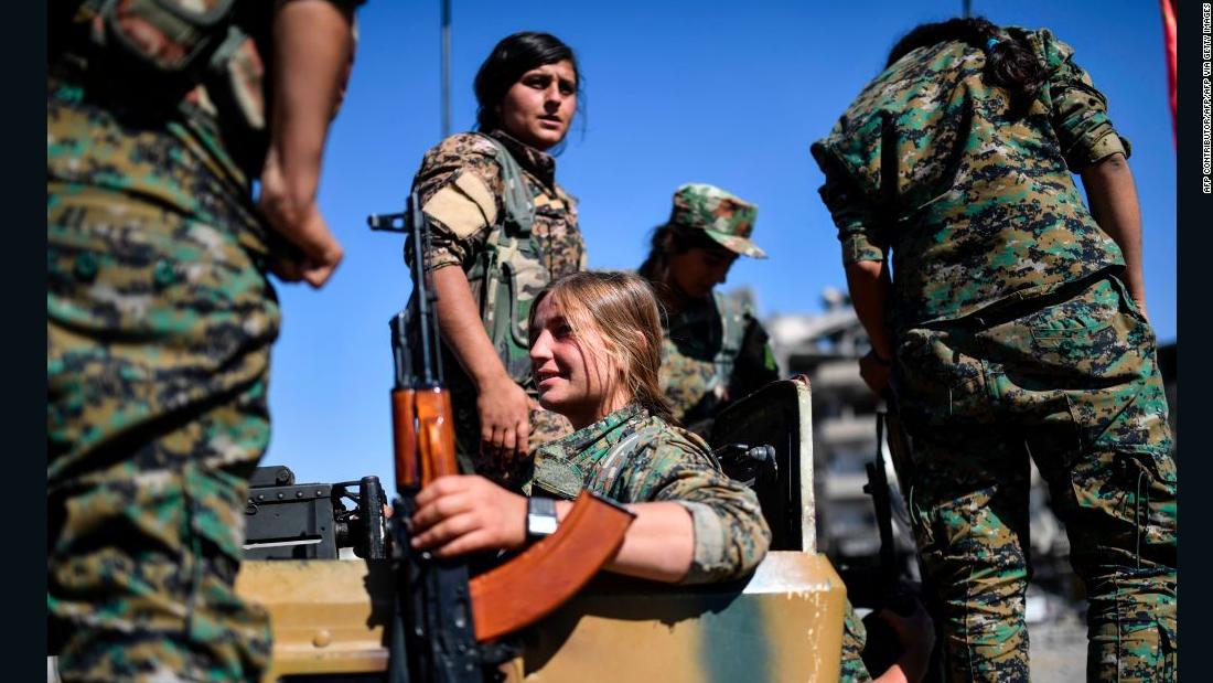 Women of YPJ gather to mark the end of the fight against ISIS in Raqqa. 