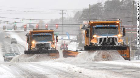 Snow plows clear the roads in Barnegat Township, New Jersey.