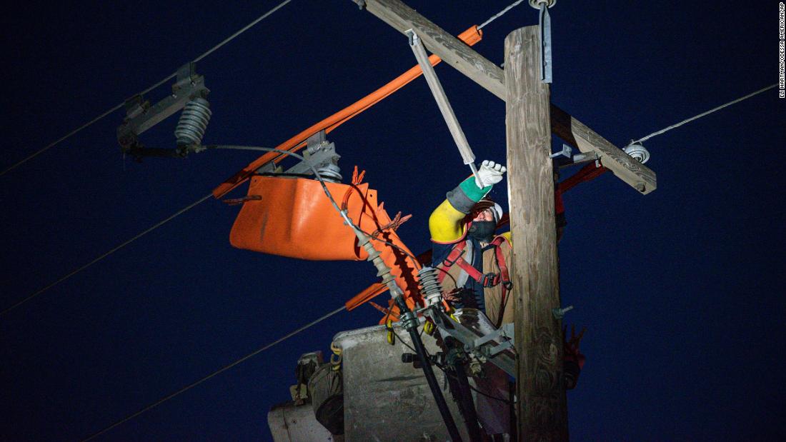 Brendan Waldon repairs a utility pole in Odessa, Texas, on Thursday, February 18.