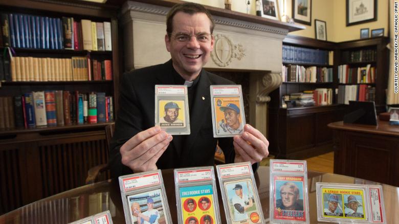 Minnesota priest auctions off baseball card collection for charity