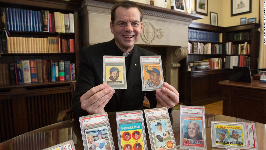Minnesota priest auctions off baseball card collection for charity