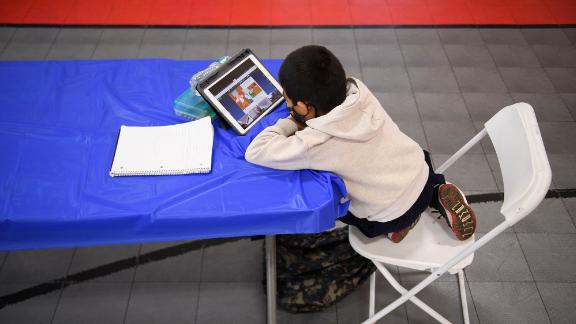 A child attends an online class at the Crenshaw Family YMCA on February 17, 2021, in Los Angeles.