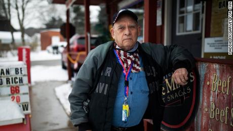 Charlie Selzer, 78, stands outside of the River Styx Market which he owns in Medina, OH on February 18, 2021.