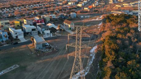 An aerial view from a drone shows electrical lines running through a neighborhood on February 19, 2021 in Austin, Texas. 