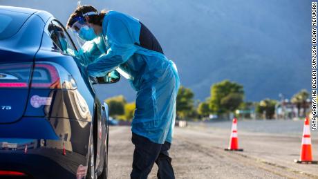 An emergency medical technician administers a Covid-19 test in Palm Springs, California, on February 17, 2021