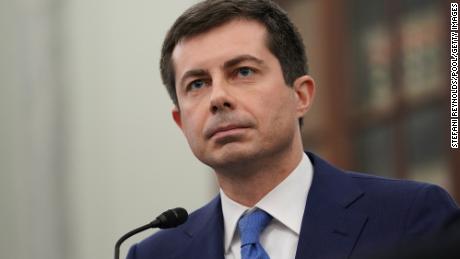 Transportation Secretary Pete Buttigieg listens during his confirmation hearing earlier this year. (Photo by Stefani Reynolds/Getty Images)