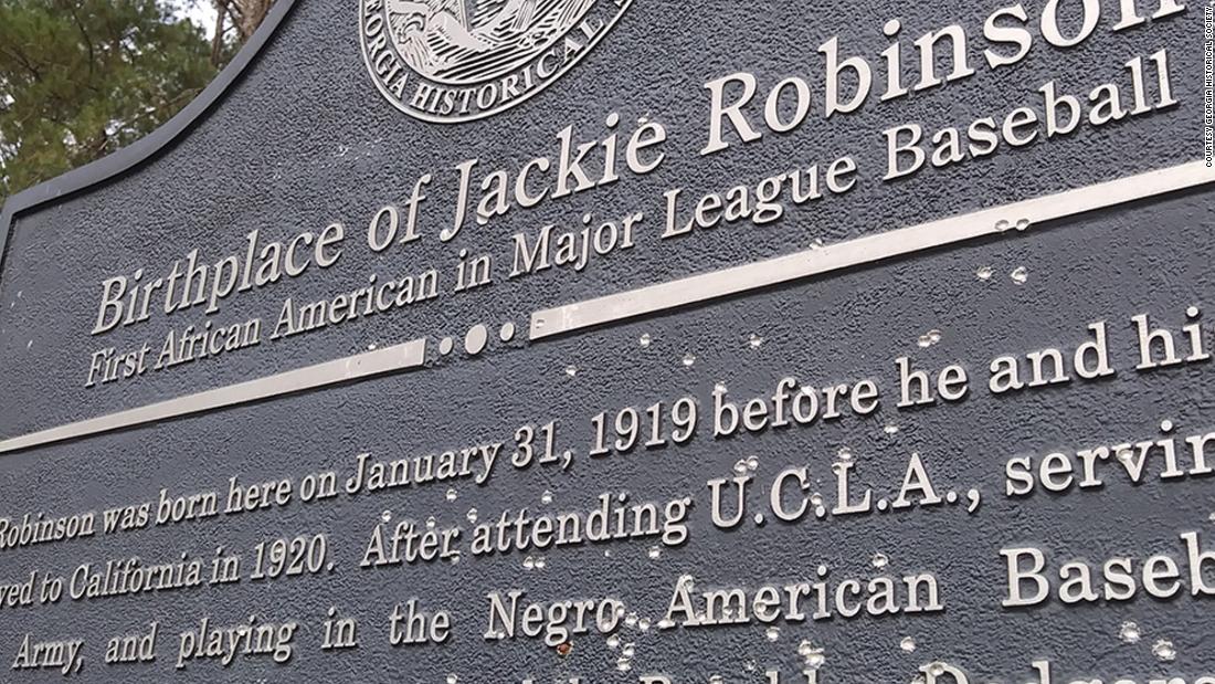 Unknown vandals shot a historical marker for Jackie Robinson and another for lynching victims in rural Georgia