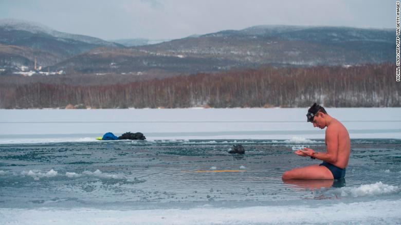 Czech free-diver breaks ice-swim world record