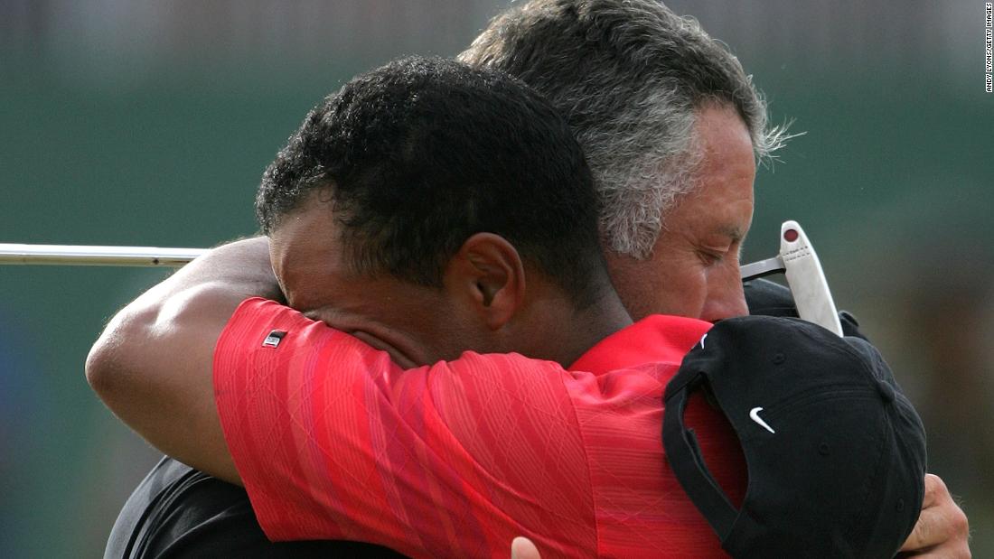 Woods hugs Williams after winning the British Open in Hoylake, England in 2006. It was Woods&#39; first major win since the death of his father just a couple of months earlier.