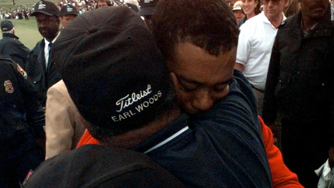 Woods hugs his father, Earl, after winning the 1997 Masters. Earl, a former Green Beret, was widely credited with developing his son&#39;s prodigious talent and pushing him to be the ultimate competitor.