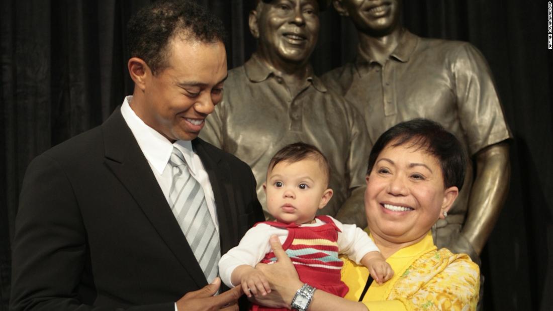 Woods stands with his mother, Kultida, and his daughter, Sam, as a statue of him and his father is unveiled at the Tiger Woods Learning Center in Anaheim, California, in January 2008.