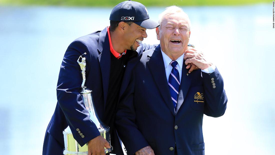 Woods jokes with golf great Arnold Palmer after winning the Bay Hill Invitational in March 2013 and regaining his spot as the world&#39;s top-ranked golfer.