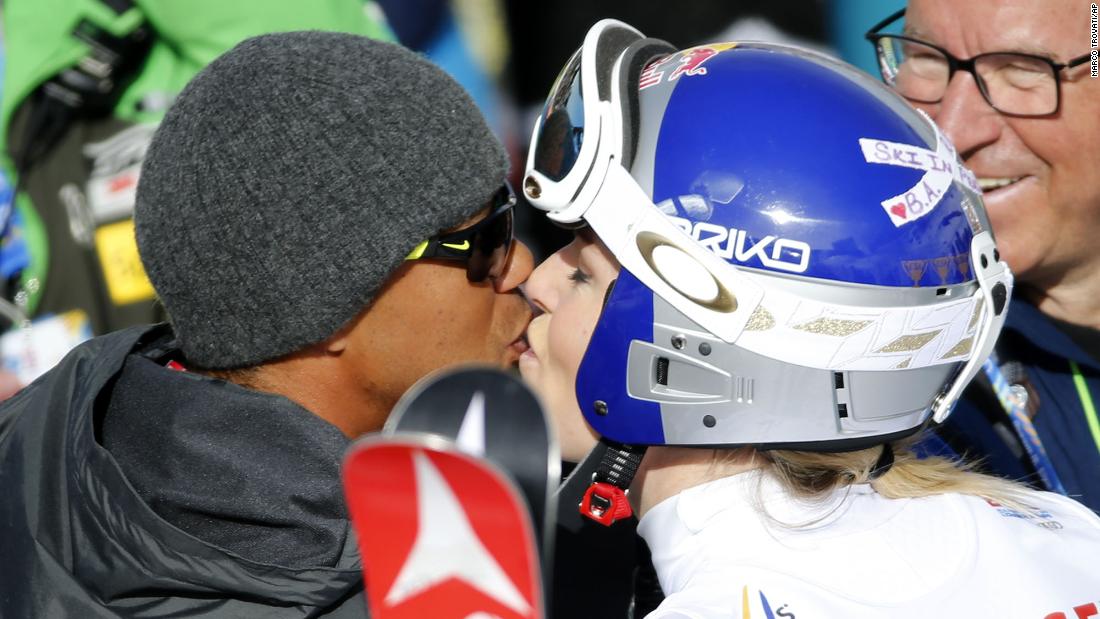 Woods kisses his then-girlfriend, skiing superstar Lindsey Vonn, at an event in Beaver Creek, Colorado, in 2015. The two dated for a couple of years.