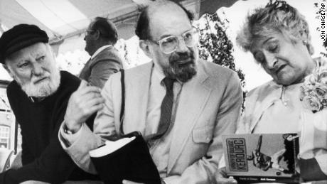 Poets Lawrence Ferlinghetti, left, and Allen Ginsberg look on as Stella Kerouac, right, autographs one of her late husband&#39;s book in  1988. 
