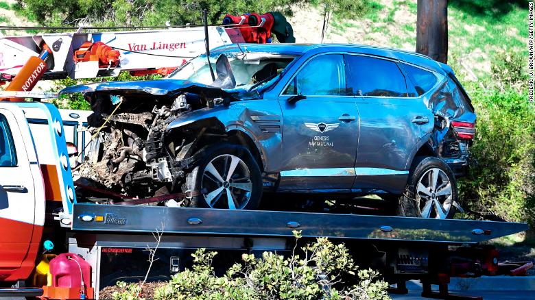 A tow truck recovers the vehicle driven by golfer Tiger Woods in Rancho Palos Verdes, California,  after a rollover accident..