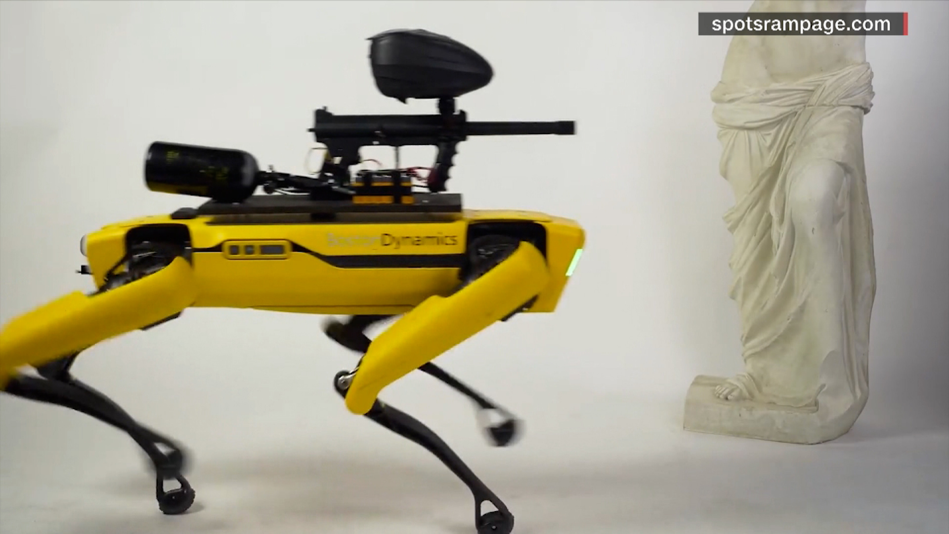 Paintball gun mounted robot dog - CNN Video