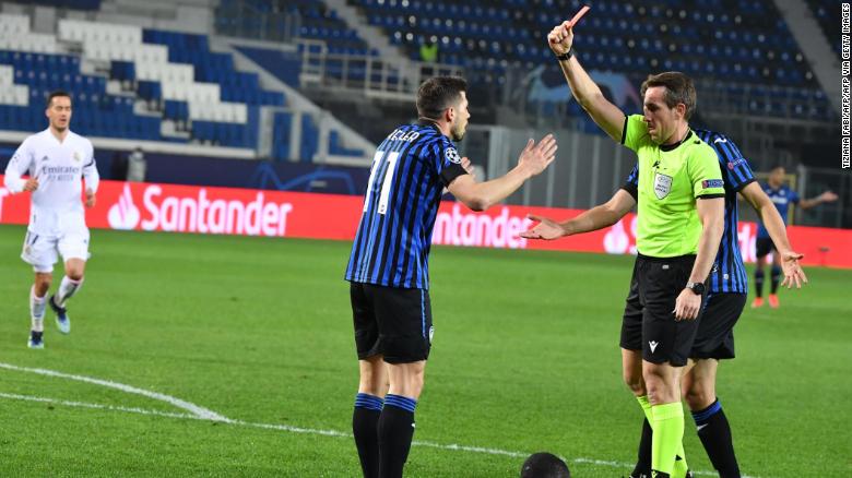 German referee Tobias Stieler shows a red card to Atalanta's Remo Freuler