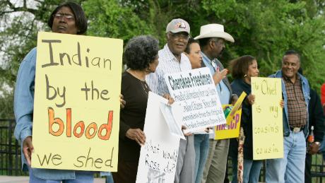 Waynetta Lawrie (left) stands with others at the Oklahoma state Capitol on March 27, 2007, during a demonstration by several Cherokee Freedmen and their supporters.