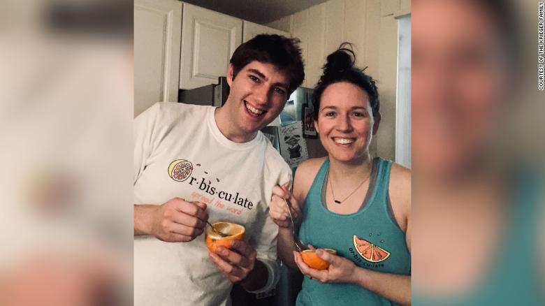 Jonathan Krieger with his partner Megan O&#39;Hara, who designed the orbisculate logo and T-shirts, in Brookline, Massachusetts.