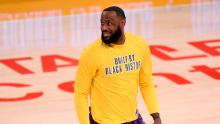 LOS ANGELES, CALIFORNIA - FEBRUARY 26: LeBron James #23 of the Los Angeles Lakers smiles as he warms up before the game against the Portland Trail Blazers at Staples Center on February 26, 2021 in Los Angeles, California. (Photo by Harry How/Getty Images) NOTE TO USER: User expressly acknowledges and agrees that, by downloading and/or using this Photograph, user is consenting to the terms and conditions of the Getty Images License Agreement. Mandatory Copyright Notice: Copyright 2021 NBAE.