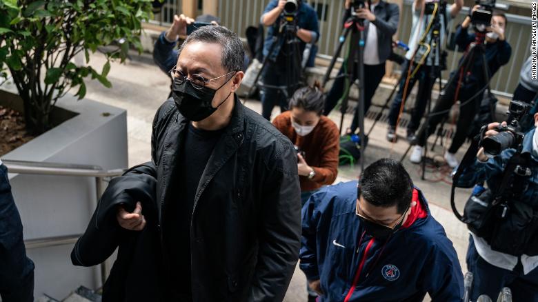 Benny Tai, associate professor of law at the University of Hong Kong and co-founder of activist group Occupy Central with Love and Peace (OCLP) reports to the Ma On Shan Police Station on February 28, in Hong Kong.