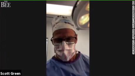Dr. Scott Green appeared during an operation for a virtual court hearing. 
