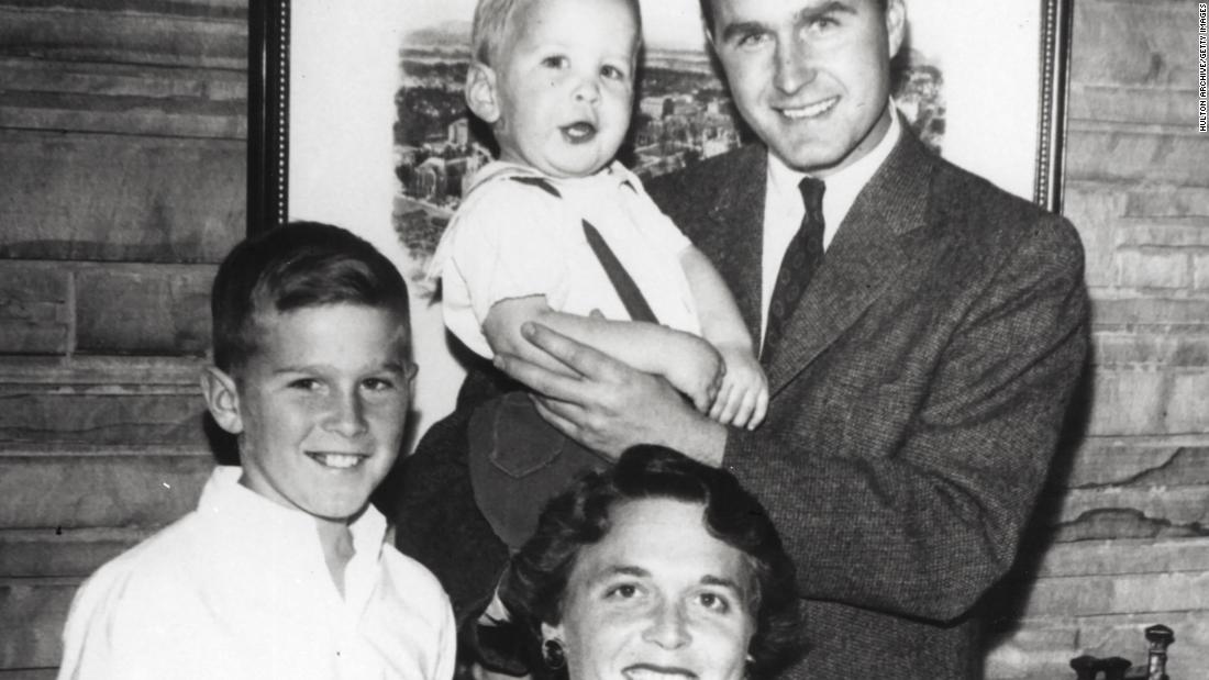 Bush, left, is the eldest child of George and Barbara Bush. Barbara is holding her youngest son, Marvin, and her husband is holding their son Neil. At bottom left is their son Jeb. The couple also had a young daughter, Robin, who died from leukemia in 1953.