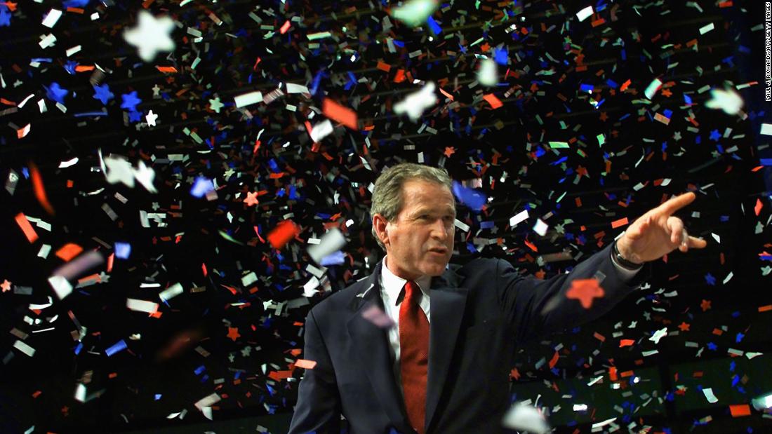 Confetti falls on Bush as he concluded his presidential campaign in Austin, Texas, in November 2000.