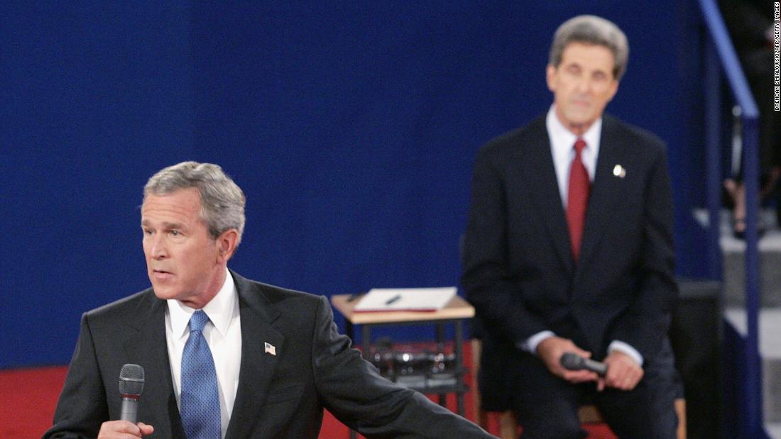 Bush addresses the audience as he debates Democratic challenger John Kerry in October 2004.