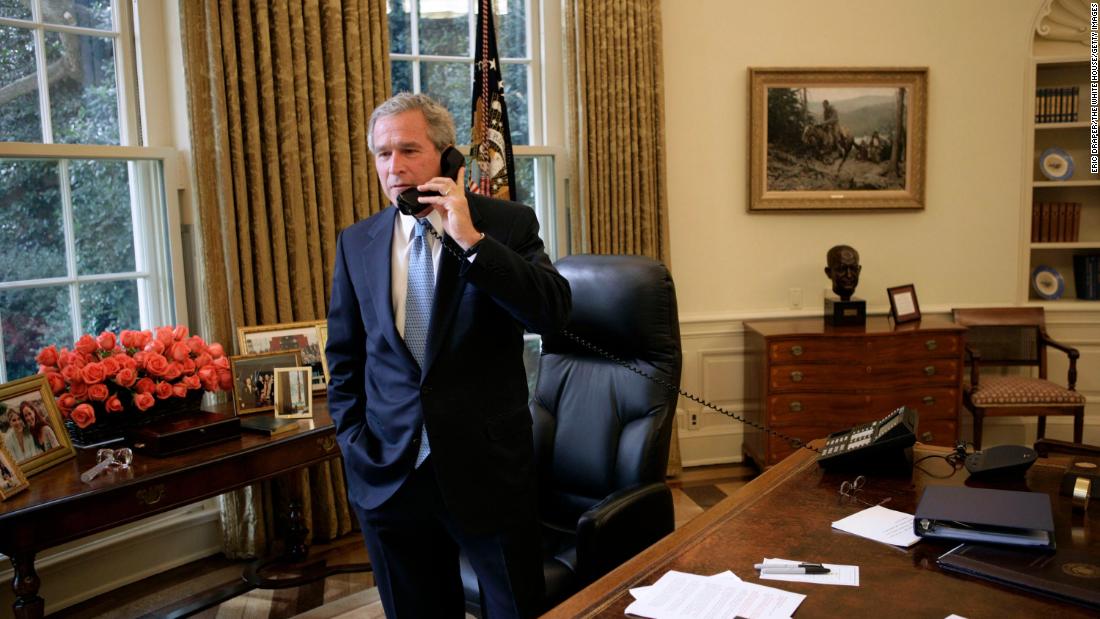 Bush takes a phone call from Kerry, who was conceding the 2004 election.