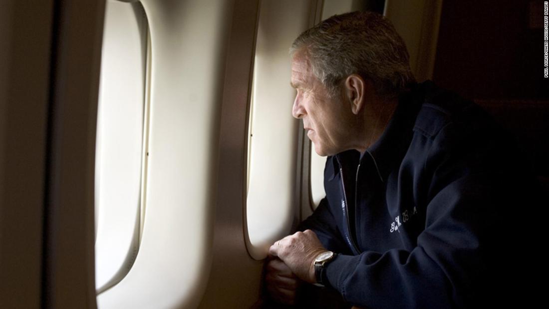 Bush surveys Hurricane Katrina damage as Air Force One flies over New Orleans in August 2005.