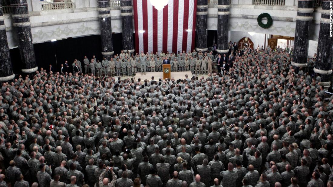 Bush speaks to US troops in Baghdad, Iraq, in December 2008.