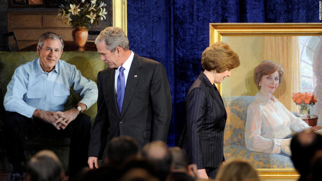 Bush and his wife, Laura, look over their portraits during their unveiling at the National Portrait Gallery in December 2008.